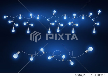 Decorative blue light bulbs illuminating on a dark background for celebration design 140410946