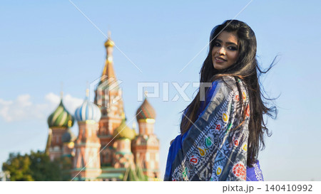 Bangladeshi woman smiling in traditional saree near Saint Basil's Cathedral, Moscow Bangladeshi woman smiling in traditional saree near Saint Basil's Cathedral, Moscow 140410992