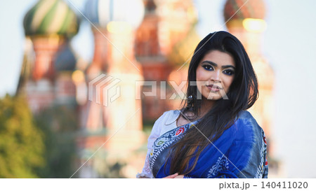 Bangladeshi woman posing in front of Saint Basil's Cathedral in Moscow, Russia Bangladeshi woman posing in front of Saint Basil's Cathedral in Moscow, Russia 140411020