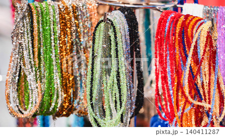India Day street market offering colorful beaded necklaces and shimmering jewelry India Day street market offering colorful beaded necklaces and shimmering jewelry 140411287