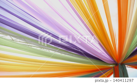 Colorful fabric drapes creating a festive ceiling at an cultural event in Moscow Colorful fabric drapes creating a festive ceiling at an cultural event in Moscow 140411297