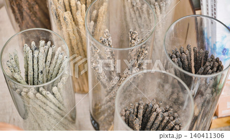 Indian incense sticks in glass jars at India Day market in Moscow Indian incense sticks in glass jars at India Day market in Moscow 140411306