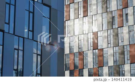 Modern skyscrapers facade in Moscow with reflecting glass and panel designs Modern skyscrapers facade in Moscow with reflecting glass and panel designs 140411419
