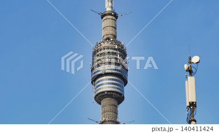Ostankino Tower transmitting broadcasting signals over blue sky in Moscow Ostankino Tower transmitting broadcasting signals over blue sky in Moscow 140411424