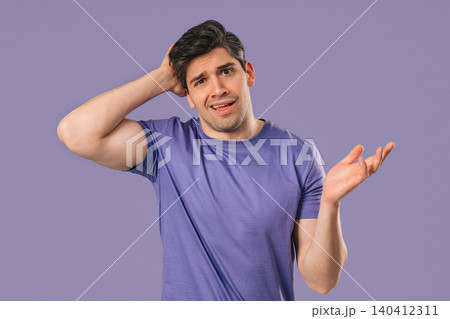 Mature man shrugs shoulders showing uncertainty, confusion, dilemma, hesitation Mature man shrugs shoulders showing uncertainty, confusion, dilemma, hesitation 140412311