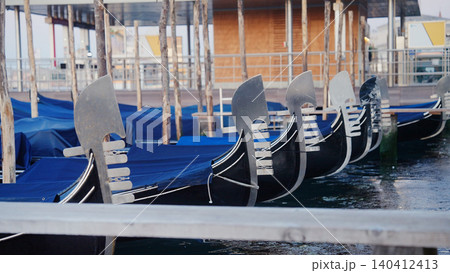 Gondolas Moored in Venice Lagoon with San Giorgio Maggiore in Background. Italy travel, tourism Gondolas Moored in Venice Lagoon with San Giorgio Maggiore in Background. Italy travel, tourism 140412413