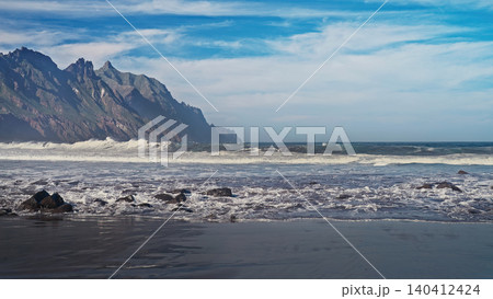 Atlantic Ocean Waves Hitting Volcanic Rocks On Rugged Coastal Shoreline, Canary Atlantic Ocean Waves Hitting Volcanic Rocks On Rugged Coastal Shoreline, Canary 140412424
