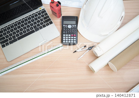 Construction and Engineering Equipment on Desk for Project Planning and Design Work 140412871