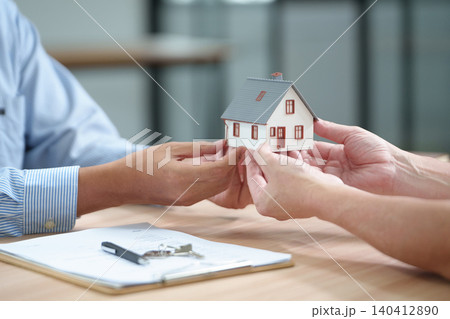 Real Estate Deal with House Model, Documents and Keys Real Estate Deal with House Model, Documents and Keys 140412890