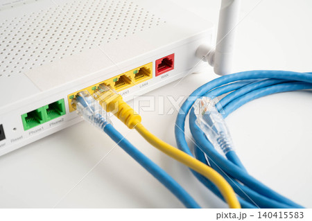 Ethernet cable with wireless router connect to internet service provider network. Ethernet cable with wireless router connect to internet service provider network. 140415583