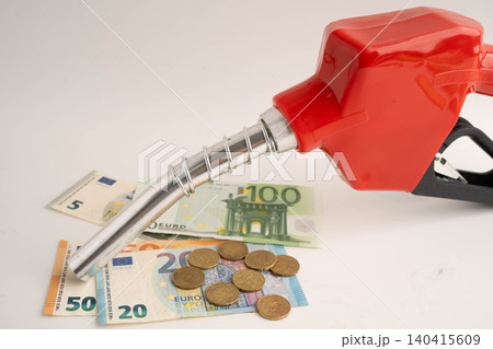 Gas pump, Fuel Nozzle with Euro money for cost energy. 140415609