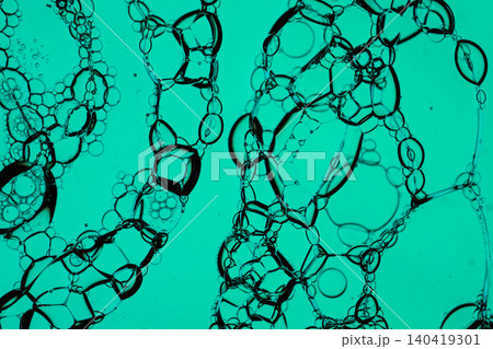 Abstract macro photography of soap bubbles and oil drops. High contrast, neon colors, and sharp details Abstract macro photography of soap bubbles and oil drops. High contrast, neon colors, and sharp details 140419301