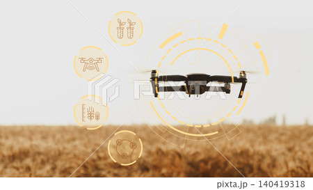 Drone flies over a smart farm field during daytime to monitor crops and gather data Drone flies over a smart farm field during daytime to monitor crops and gather data 140419318