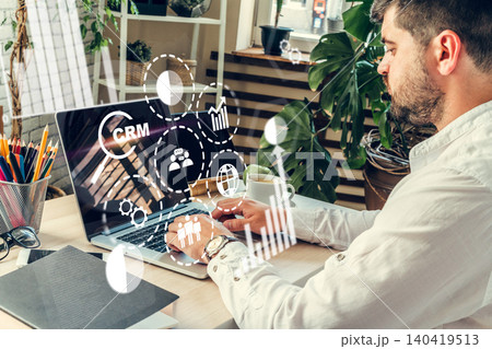 Using CRM software for managing customer relationships in a modern workspace 140419513
