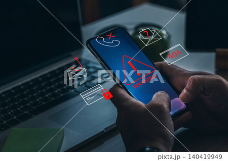 Scam call sms message received on smartphone during work hours in a home office setting Scam call sms message received on smartphone during work hours in a home office setting 140419949