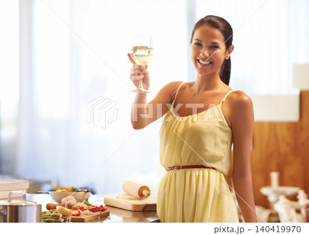 Woman, happy and smile with wine glass while cooking, vegetables and cheers for celebration in kitchen. Female person, food and alcohol while preparing dinner, meal for nutrition at home or house Woman, happy and smile with wine glass while cooking, vegetables and cheers for celebration in kitchen. Female person, food and alcohol while preparing dinner, meal for nutrition at home or house 140419970