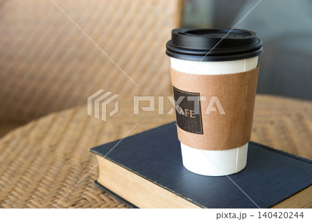 The leisure of a cup of coffee at a cafe The leisure of a cup of coffee at a cafe 140420244