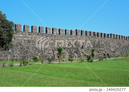 Gonio Fortress in Ajara, Georgia, near Batumi. Bright sunny day, blue sky Gonio Fortress in Ajara, Georgia, near Batumi. Bright sunny day, blue sky 140420277