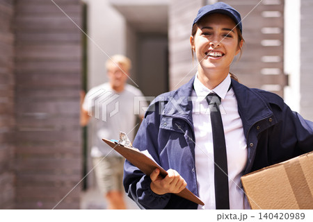 Delivery woman, box and clipboard in portrait at house for customer with smile for shipping in neighborhood. Girl, courier and employee in supply chain, logistics and checklist for cardboard package 140420989