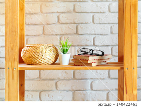 Wooden rack shelf with home decor stuff 140422463