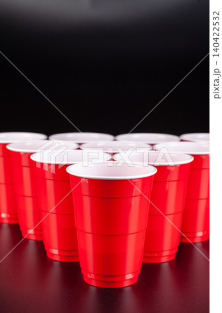 The arrangement of red plastic cups for game of beer pong The arrangement of red plastic cups for game of beer pong 140422532