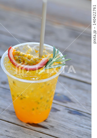 passion fruit juice , passion fruit soda or mocktail or cocktail passion fruit juice , passion fruit soda or mocktail or cocktail 140422761