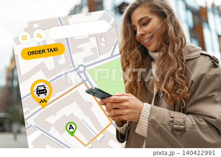 Finding a taxi on a travel map in the city while using a smartphone Finding a taxi on a travel map in the city while using a smartphone 140422991