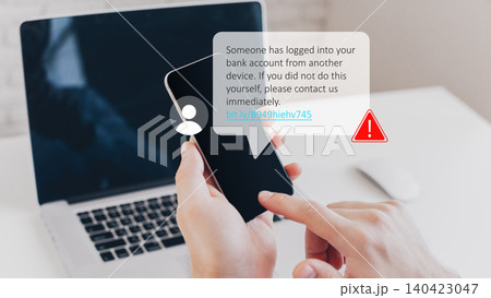 Warning message about bank account access from another device seen on a smartphone screen Warning message about bank account access from another device seen on a smartphone screen 140423047