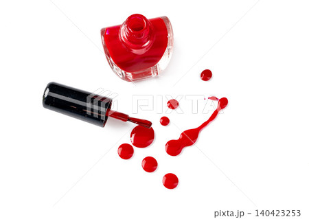 Bright colored nail polish bottles with drippings on white background Bright colored nail polish bottles with drippings on white background 140423253