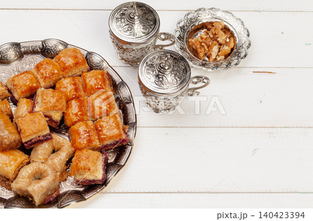 Cup of hot tea and a plate of turkish desserts Cup of hot tea and a plate of turkish desserts 140423394