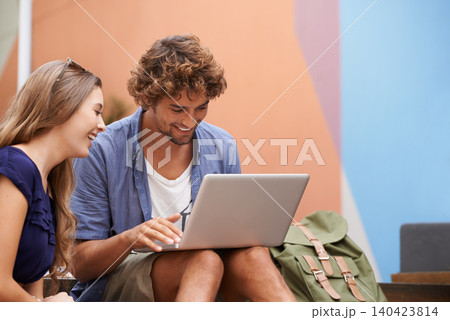 College students, smile and happy together with laptop laugh, discuss ideas and work on campus. University learning, man and woman busy on computer with internet, connectivity and research or project 140423814