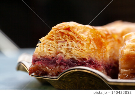 Plate of baklava dessert close up served on table Plate of baklava dessert close up served on table 140423852