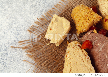 Assortment of turkish desserts baklava and halva Assortment of turkish desserts baklava and halva 140424229