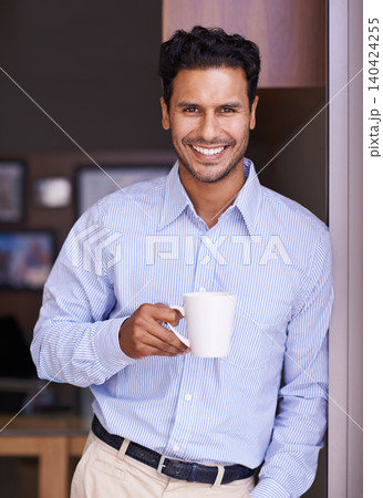 Portrait, coffee and business man in office with confidence, pride and smile in workplace. Professional worker, corporate and happy person drinking caffeine, warm beverage and cappuccino on break Portrait, coffee and business man in office with confidence, pride and smile in workplace. Professional worker, corporate and happy person drinking caffeine, warm beverage and cappuccino on break 140424255