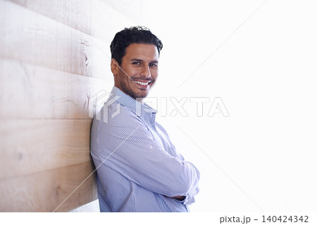 Businessman, portrait and positive professional by wood background and confidence in consulting company. Entrepreneur, indian person and face in startup business and commitment or happy in career Businessman, portrait and positive professional by wood background and confidence in consulting company. Entrepreneur, indian person and face in startup business and commitment or happy in career 140424342
