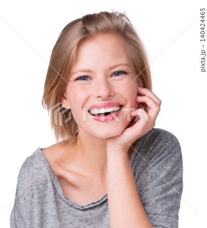 Woman, studio and portrait with smile, hand and confidence for natural beauty. Model, face and happiness with skincare, treatment and pride with cosmetic and sitting isolated on white background Woman, studio and portrait with smile, hand and confidence for natural beauty. Model, face and happiness with skincare, treatment and pride with cosmetic and sitting isolated on white background 140424465