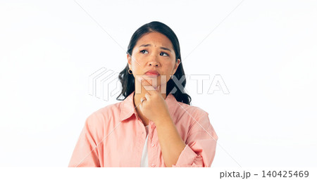Thinking, confused and asian woman in studio for brainstorming, solution or memory on white background. Why, idea and female model with questions, emoji or problem solving, doubt or planning gesture 140425469