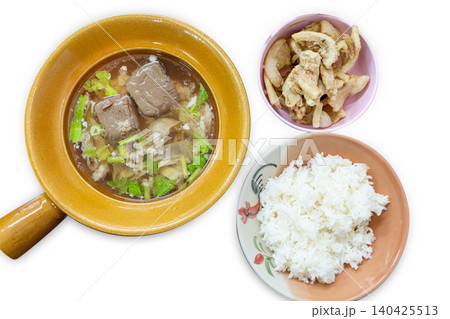 Top view of Clear Soup with Pork and Pork Offal, Pork Blood Soup, and Steamed Rice, focus selective Top view of Clear Soup with Pork and Pork Offal, Pork Blood Soup, and Steamed Rice, focus selective 140425513