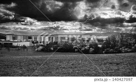 Black and White Cityscape Under Dramatic Clouds Black and White Cityscape Under Dramatic Clouds 140427097