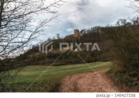Hilltop Castle Ruins Above Rural Dirt Road Hilltop Castle Ruins Above Rural Dirt Road 140427108