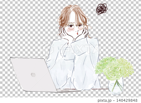 A grumpy woman working on her laptop. 140429848