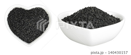 Nigella sativa or Black cumin in ceramic bowl isolated on white background. Top view. Flat lay. Nigella sativa or Black cumin in ceramic bowl isolated on white background. Top view. Flat lay. 140430157