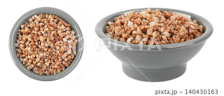 Boiled buckwheat in a ceramic bowl isolated on white background. Top view. Flat lay Boiled buckwheat in a ceramic bowl isolated on white background. Top view. Flat lay 140430163