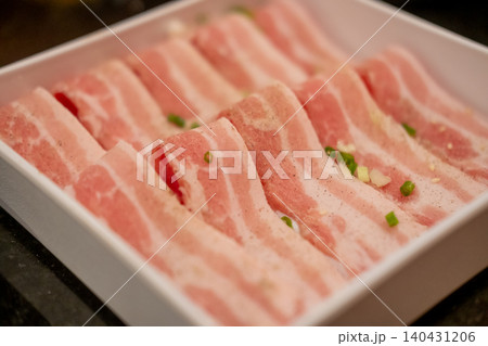 Close up of sliced raw bacon. prepared for cooking Close up of sliced raw bacon. prepared for cooking 140431206