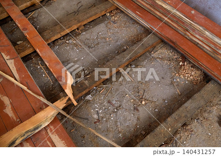 The house is undergoing renovation work to replace the old wooden floors The house is undergoing renovation work to replace the old wooden floors 140431257