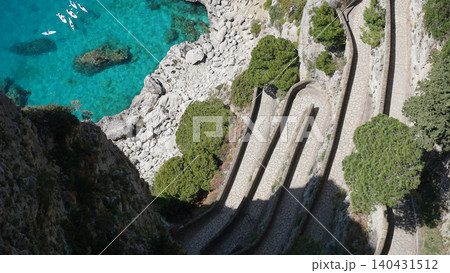 The serpentine road of Via Krupp, Capri. Aerial view of the famous winding Via Krupp in Capri. The serpentine road of Via Krupp, Capri. Aerial view of the famous winding Via Krupp in Capri. 140431512