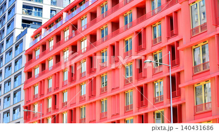 View of modern residential building with glass balconies and bright facade. Contemporary apartment building in european city. Concept of urban living and modern architecture.  140431686