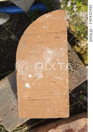 Weathered Red Clay Brick Closeup Weathered Red Clay Brick Closeup 140432492