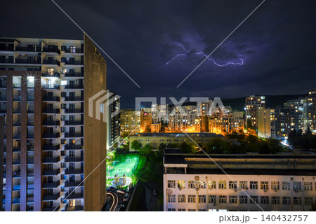City apartments under lightning at night in Tbilisi, Georgia City apartments under lightning at night in Tbilisi, Georgia 140432757