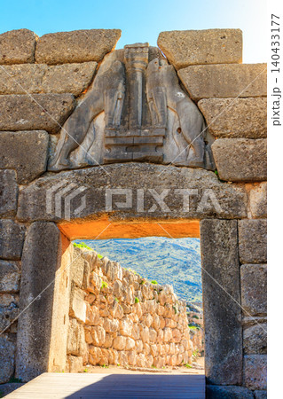 Lion's gate, the main entrance of the citadel of Mycenae. Archaeological site of Mycenae in Peloponnese, Greece Lion's gate, the main entrance of the citadel of Mycenae. Archaeological site of Mycenae in Peloponnese, Greece 140433177